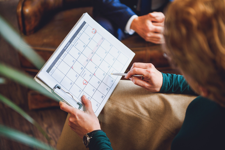 Caregiver working on calendar